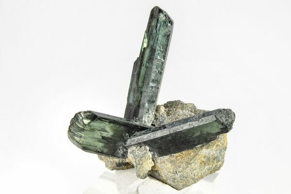 A cluster of gorgeous emerald-green vivianite crystals, collected from the Roșia Poieni Mine in Alba County, Romania. 